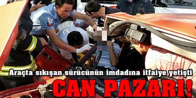Yaralı sürücüyü itfaiye kurtardı