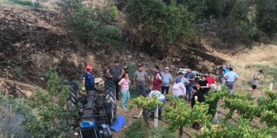Devrilen traktörün altında kalan karı koca hayatını kaybetti